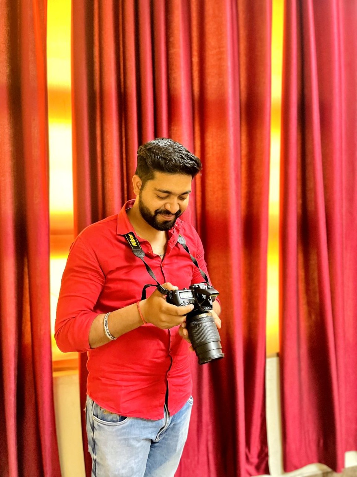 Darshan Yaduvanshi with a camera backstage